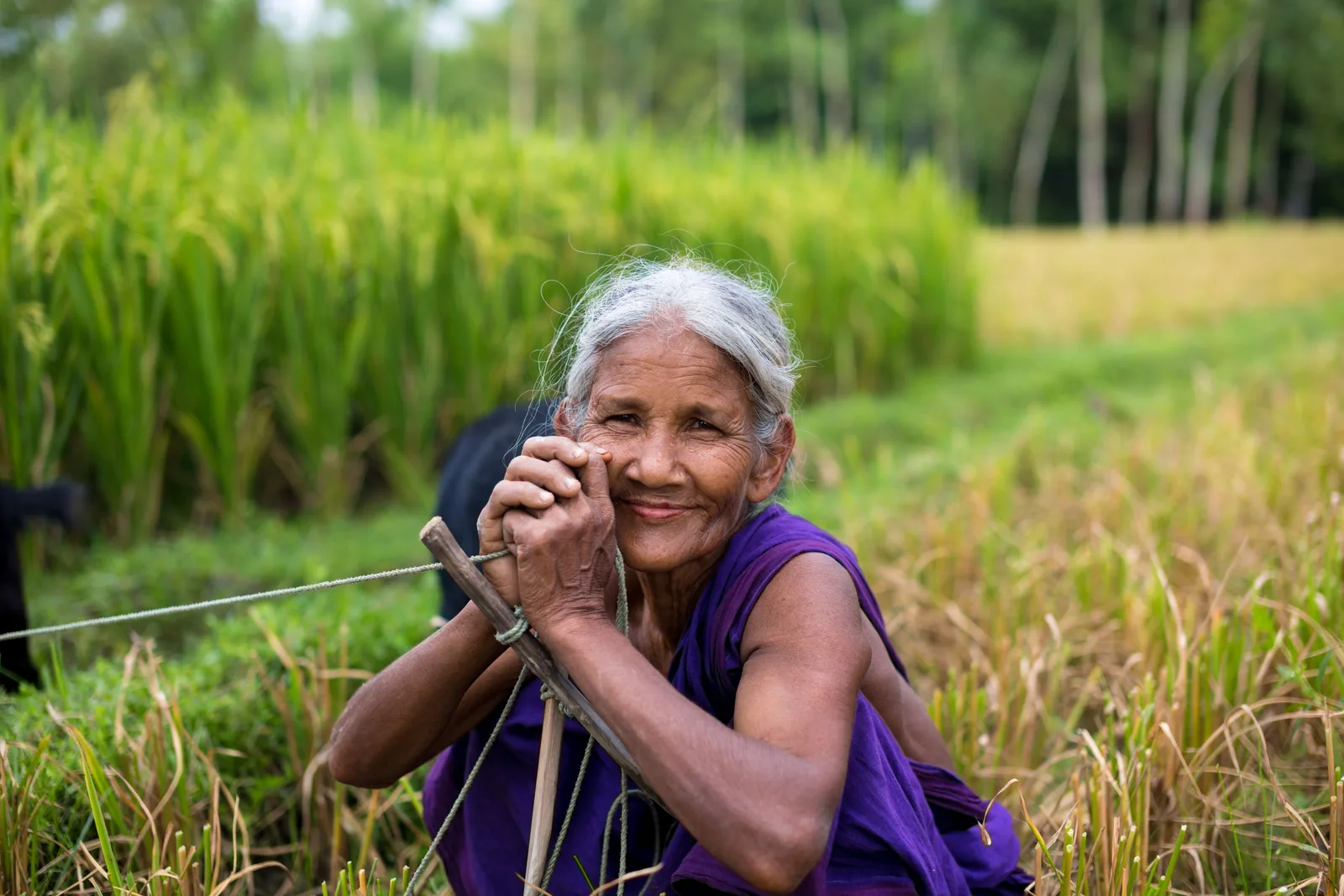 Farmer smiling in her community